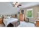 Charming bedroom with natural light, cozy decor, and comfortable furnishings at 5623 Brendlynn Dr, Suwanee, GA 30024