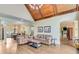 Cozy living room features a tray ceiling, hardwood flooring, and ample natural light at 5623 Brendlynn Dr, Suwanee, GA 30024