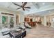Inviting living space with coffered ceilings and a smooth transition to outdoor living at 5623 Brendlynn Dr, Suwanee, GA 30024