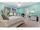 Bright bedroom with ample space, a hammock chair, and a serene atmosphere with a view to the outdoors at 2220 Peachtree Rd, Cumming, GA 30041