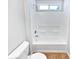 Bathroom features a shower-tub and toilet at 6560 Alford Way, Lithonia, GA 30058
