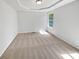 Spacious bedroom with a large window offering plenty of natural light at 6560 Alford Way, Lithonia, GA 30058