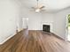 Spacious living room featuring a fireplace and door leading to a deck at 6560 Alford Way, Lithonia, GA 30058