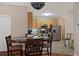Charming eat-in kitchen featuring warm wood cabinetry and stainless steel appliances at 3734 Villa Springs Cir, Powder Springs, GA 30127