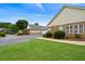 Serene and well-maintained property with lush greenery and manicured landscaping at 3734 Villa Springs Cir, Powder Springs, GA 30127