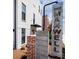 Modern white brick townhouse with black window trim and a prominent Maxwell sign at 401 Burton Dr, Alpharetta, GA 30009