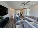 Inviting open-concept living space with hardwood floors and an adjacent, eat-in kitchen at 401 Burton Dr, Alpharetta, GA 30009