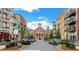 Street view of The Maxwell's central avenue with shops, apartments, and public spaces at 401 Burton Dr, Alpharetta, GA 30009