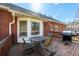 Deck with exterior view, ideal for outdoor dining and relaxation, complete with grill at 5826 Little Mountain Dr, Ellenwood, GA 30294