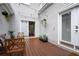 Outdoor deck with string lighting and potted plants at 893 Piedmont Ne Ave # 3, Atlanta, GA 30309