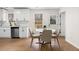 Cozy dining area adjacent to the kitchen with views of the deck at 247 Mandy Ct, Mcdonough, GA 30252