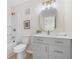 Bathroom with updated vanity and fixtures, a framed mirror, and shower-tub combo at 3326 Northcrest Rd # C, Atlanta, GA 30340