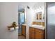 Well-lit bathroom featuring tiled floors, vanity with drawers, and shower at 3449 Parkview Dr, Atlanta, GA 30337