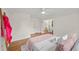 Bedroom features hardwood flooring, white walls, and two closets at 3449 Parkview Dr, Atlanta, GA 30337