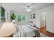 Bright bedroom with windows, hardwood floors, and a seating area for relaxing at 3449 Parkview Dr, Atlanta, GA 30337