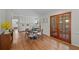 Bright dining area featuring hardwood floors with views through french doors at 3449 Parkview Dr, Atlanta, GA 30337