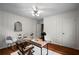 Stylish home office features wood floors, panelled walls, modern decor, and bright lighting at 3449 Parkview Dr, Atlanta, GA 30337