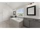 Chic bathroom with a soaking tub, double sinks, and ample natural light at 4105 Woodwind Dr, Cumming, GA 30028