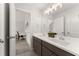 Modern bathroom featuring a double vanity, quartz countertop, and stylish fixtures at 4105 Woodwind Dr, Cumming, GA 30028