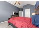 Bedroom with neutral walls, a comfortable bed, and natural lighting at 4105 Woodwind Dr, Cumming, GA 30028