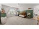Cozy Bedroom features neutral tones, a crib, and plenty of natural light at 4105 Woodwind Dr, Cumming, GA 30028