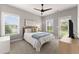 Inviting bedroom with natural light, ceiling fan, and warm color palette at 4105 Woodwind Dr, Cumming, GA 30028