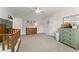 Spacious Bedroom showcases a crib, dresser, and calming decor at 4105 Woodwind Dr, Cumming, GA 30028