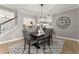 Open concept dining area features modern decor and stylish lighting at 4105 Woodwind Dr, Cumming, GA 30028