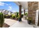 Charming front porch and meticulously landscaped walkway to the welcoming Gathering home at 4105 Woodwind Dr, Cumming, GA 30028
