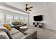 Large living room featuring abundant natural light, and comfortable seating at 4105 Woodwind Dr, Cumming, GA 30028