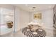 Cozy dining area featuring a round table, modern chairs, and stylish decor at 115 Cross Roads Ct, Atlanta, GA 30327