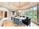 Bright dining room with bay window and stylish decor at 115 Cross Roads Ct, Atlanta, GA 30327
