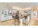 Modern kitchen features sleek cabinetry, a large island with seating, and stainless steel appliances at 115 Cross Roads Ct, Atlanta, GA 30327