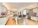 Modern kitchen with sleek white cabinets, black countertops, and stainless steel appliances at 115 Cross Roads Ct, Atlanta, GA 30327