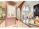 Features a wet bar with granite counter and access to the great room at 115 Cross Roads Ct, Atlanta, GA 30327