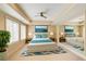 Main bedroom with mirrored wall, blue accents, and lots of natural light at 115 Cross Roads Ct, Atlanta, GA 30327