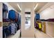 Walk-in closet with organized shelving and clothing racks at 199 Eastham Ct, Suwanee, GA 30024
