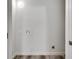 Utility room features washer/dryer hookups, wood-look flooring and access to the main area at 2216 Marbut Farms Trce, Lithonia, GA 30058
