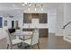 Charming dining area with a glass table and stylish built-in cabinetry at 2497 Wawona Dr, Brookhaven, GA 30319