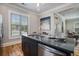 Bright modern kitchen featuring stainless steel appliances and a gray stone island at 50 Ormond Sw St, Atlanta, GA 30315