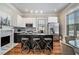 Modern kitchen with stainless steel appliances, island with seating, and sleek countertops at 50 Ormond Sw St, Atlanta, GA 30315