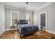 Serene main bedroom with hardwood floors and en-suite bathroom at 50 Ormond Sw St, Atlanta, GA 30315