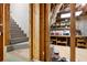 Unfinished basement with exposed beams, workshop area, and stairs at 6061 Meridian Nw Dr, Acworth, GA 30101