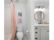 Charming bathroom with modern vanity, toilet, and tub-shower with subway tile at 6061 Meridian Nw Dr, Acworth, GA 30101