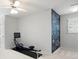 Home exercise room with rowing machine and chalkboard accent wall at 6061 Meridian Nw Dr, Acworth, GA 30101