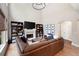 Great room boasts soaring ceilings, a fireplace, and oversized windows at 6061 Meridian Nw Dr, Acworth, GA 30101