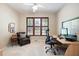 Office with neutral colored walls, carpeted floors, and a modern desk setup at 6061 Meridian Nw Dr, Acworth, GA 30101