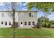Backyard with a patio, green grass and a privacy fence at 101 Priestwood Ln, Acworth, GA 30102