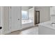 Elegant bathroom featuring tub, shower, and vanity at 2239 Noelle Pl, Powder Springs, GA 30127