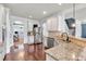 Well-equipped kitchen featuring stainless steel appliances and an open layout at 2239 Noelle Pl, Powder Springs, GA 30127